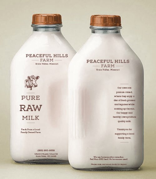 99255248_2855100084612580_3241875627514527744_n (1) Two glass bottles of raw milk from Peaceful Hills Farm, located in Grain Valley, Missouri. The labels highlight "Pure Raw Milk," emphasizing freshness from a local family-owned farm. The design features a cow graphic and a message about sustainable farming practices.